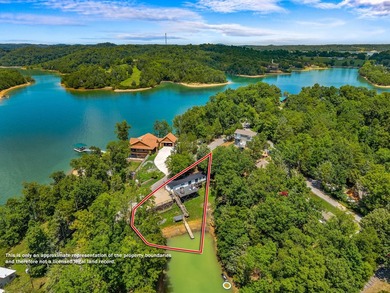 Welcome home to this charming, fully updated lake retreat on - photo 4