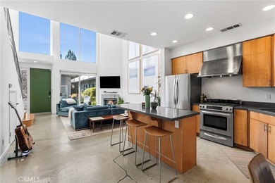 Behind privacy gates in the coveted Artist Lofts, this move-in - photo 4