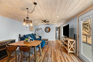 Welcome home to this charming, fully updated lake retreat on - photo 5