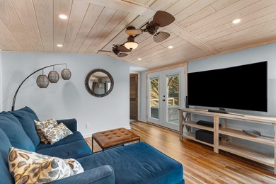 Welcome home to this charming, fully updated lake retreat on - photo 6