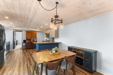 Welcome home to this charming, fully updated lake retreat on - photo 8