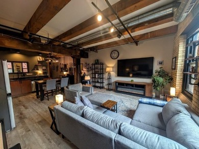 This beautifully maintained, open-concept condo/loft at River - photo 12