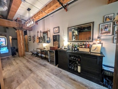 This beautifully maintained, open-concept condo/loft at River - photo 13