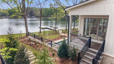 'PENNY'S PLACE' SET ALONG THE SHORELINE OF LAKE OCONEE, IS A - photo 14