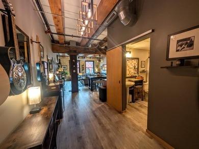 This beautifully maintained, open-concept condo/loft at River - photo 14