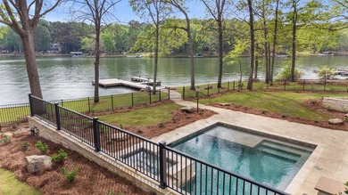 'PENNY'S PLACE' SET ALONG THE SHORELINE OF LAKE OCONEE, IS A - photo 15