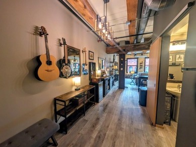 This beautifully maintained, open-concept condo/loft at River - photo 15