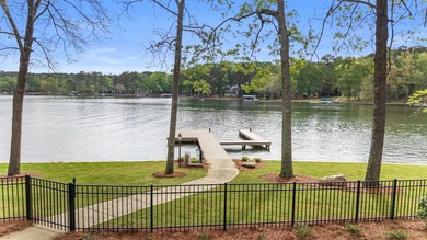 'PENNY'S PLACE' SET ALONG THE SHORELINE OF LAKE OCONEE, IS A - photo 16