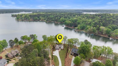'PENNY'S PLACE' SET ALONG THE SHORELINE OF LAKE OCONEE, IS A - photo 20