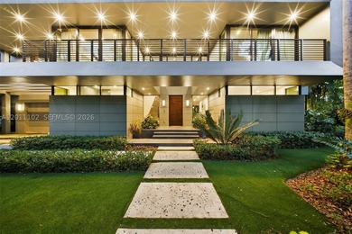 Stunning Coconut Grove residence showcasing soaring ceilings and - photo 2