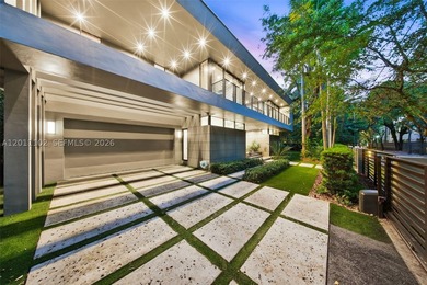 Stunning Coconut Grove residence showcasing soaring ceilings and - photo 3