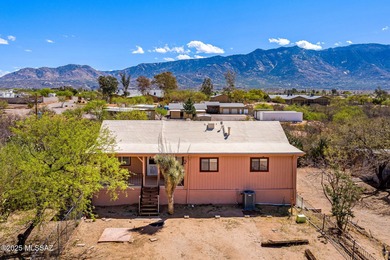 Welcome to the home that can be that and more! On an acre of