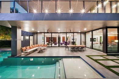 Stunning Coconut Grove residence showcasing soaring ceilings and - photo 4