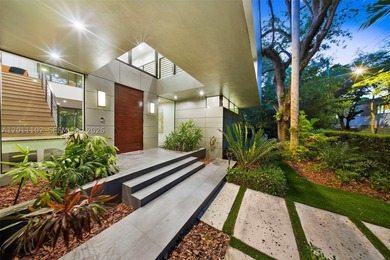 Stunning Coconut Grove residence showcasing soaring ceilings and - photo 6
