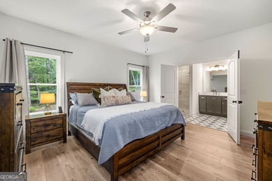 Nestled in the gated community of The Orchard Golf & Country - photo 14