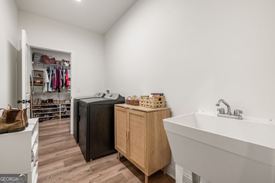 Nestled in the gated community of The Orchard Golf & Country - photo 19