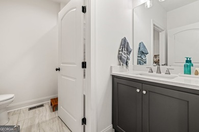 Nestled in the gated community of The Orchard Golf & Country - photo 25