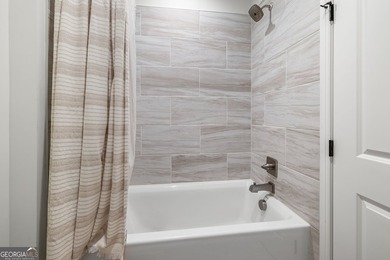 Nestled in the gated community of The Orchard Golf & Country - photo 26