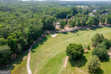 Nestled in the gated community of The Orchard Golf & Country - photo 41