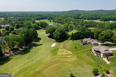 Nestled in the gated community of The Orchard Golf & Country - photo 43