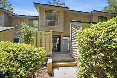 Come to the beach! This beautifully updated villa features newly - photo 1