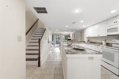 Come to the beach! This beautifully updated villa features newly - photo 5