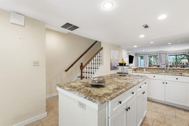 Come to the beach! This beautifully updated villa features newly - photo 6