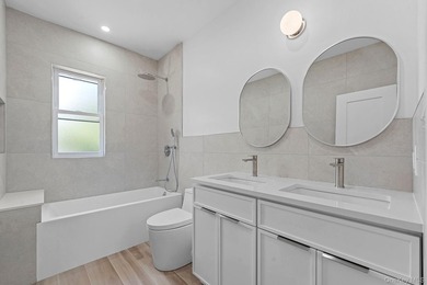 Experience modern living at its finest in this newly renovated - photo 4