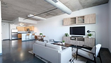 Experience vibrant city living at Centennial House - where style