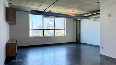 Experience vibrant city living at Centennial House - where style