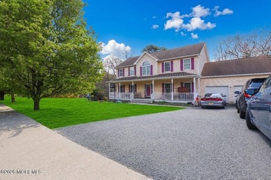 Set on an expansive 1.22-acre lot, this well-appointed approx - photo 2