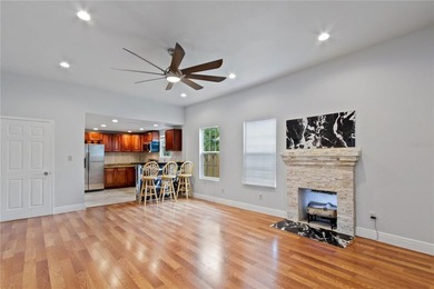 This meticulously renovated property features a new, detached - photo 4