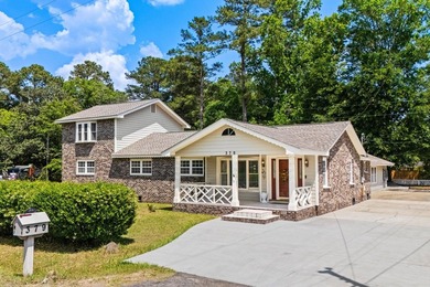From the moment you arrive, this home tells a story. Over the - photo 1