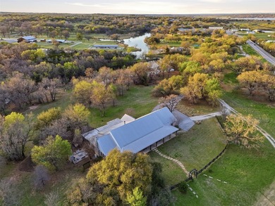 Tucked away on 21 pristine acres along a private stretch of Lake - photo 3