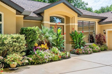 You'll be amazed by the beautifully landscaped front garden - photo 2