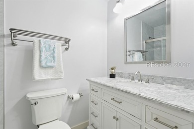 Come to the beach! This beautifully updated villa features newly - photo 21