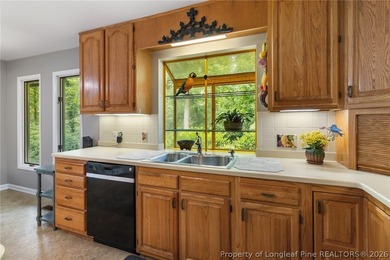 Experience elevated lake living in the gated golf and lake - photo 29