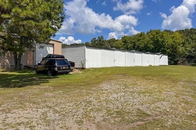 Approximately 2 acres of land with a total of 8,120 sq ft of - photo 8