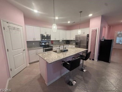Beautiful 4BR/3BA Trevi Model Home! This stunning home features - photo 3