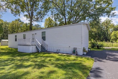 Nestled in the tranquil and gated community of Owens Mobile Park - photo 1