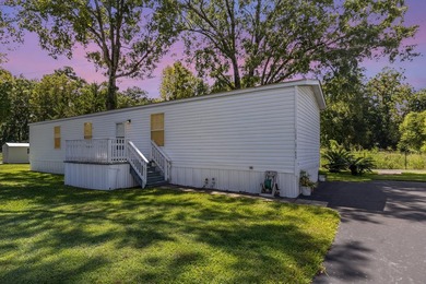 Nestled in the tranquil and gated community of Owens Mobile Park - photo 2