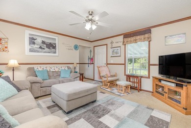 Nestled in the tranquil and gated community of Owens Mobile Park - photo 4