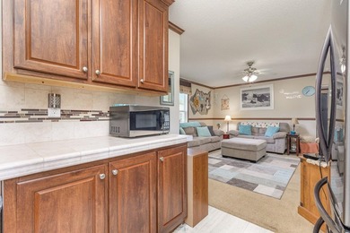 Nestled in the tranquil and gated community of Owens Mobile Park - photo 10