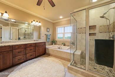 Perched on a hill within the prestigious gated community of - photo 12