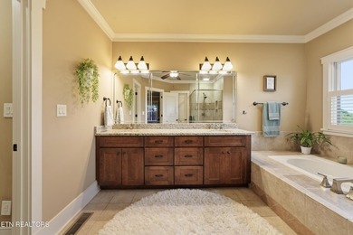 Perched on a hill within the prestigious gated community of - photo 14