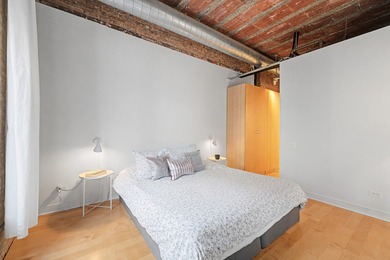 Welcome to this rarely available one-bedroom loft in the iconic