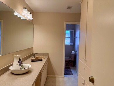 Location, Location, Location! This beautiful garden home is - photo 18