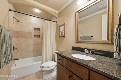 Perched on a hill within the prestigious gated community of - photo 20