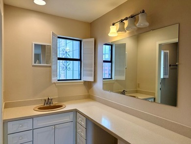 Location, Location, Location! This beautiful garden home is - photo 23