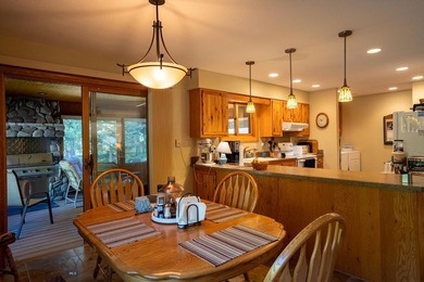 Nestled among the pines in a peaceful mountain setting, this - photo 30